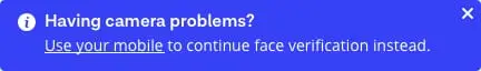 Desktop alert message reads 'Having camera problems? Use your mobile to continue face verification instead.' Two options available for user are 'Dismiss' or 'Use my mobile phone'